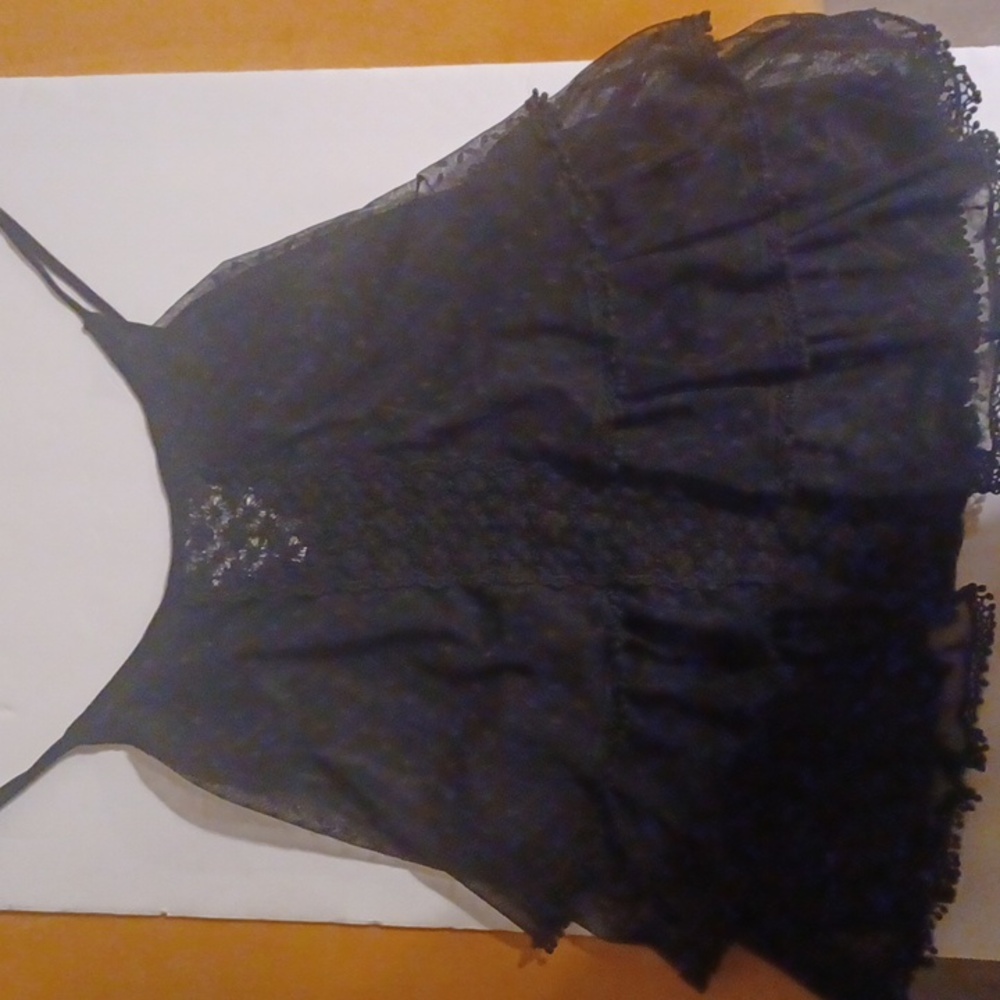 Small imaginary voyage black ruffle flair tank top